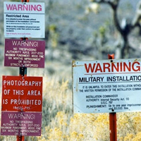 Area 51 Warning Signs at entrance. This site is watched 24/7 by armed guards about 1/4 mile up the hill. There are numerous vibration/ motion sensors as well.